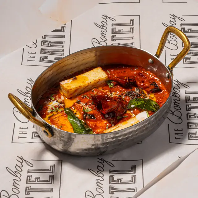 A plated signature dish from The Bombay Cartel.